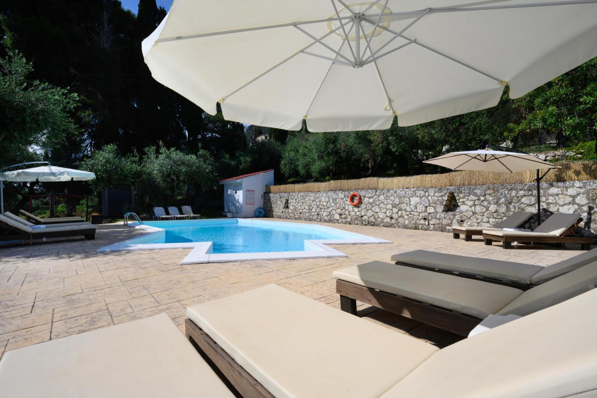 Olive Grove Poolside Apartments Benitses  Exterior photo