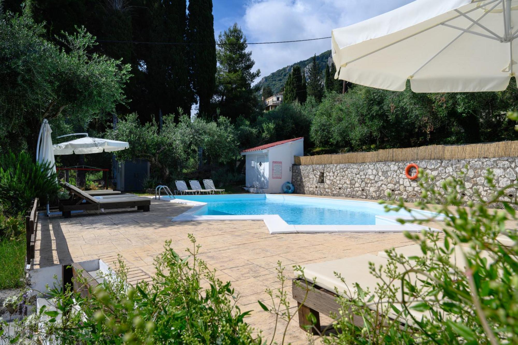 Olive Grove Poolside Apartments Benitses  Exterior photo